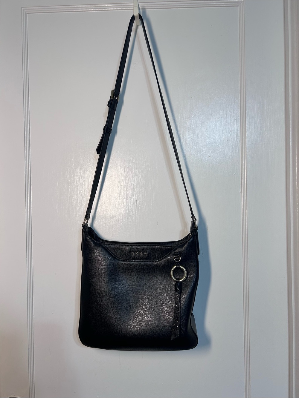 DKNY Black Pebbled Leather Shoulder Bag with gold hardware and adjustable strap